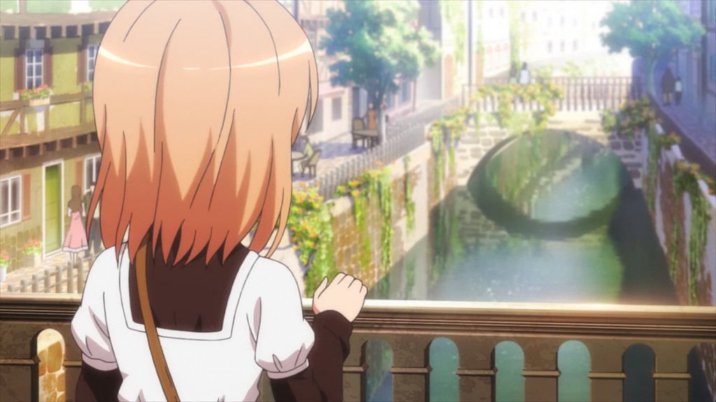 Cocoa looks down the river as she wanders round town.